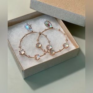 Kendra Scott rose gold hoops with iridescent stones. Limited edition.